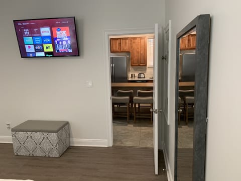 Master bedroom with 50” smart tv