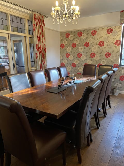 The dining room seats 12 (and 2 lowered bar stools can be used to seat up to 14)