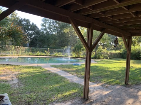 Swimming Pool View from under the elevated Patio.