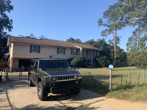 Front Yard View with old Hummer, one of my Shilohs "Blue" and the front gazebo.
