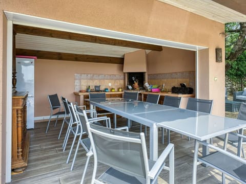 Table, Furniture, Property, Chair, Building, Window, Shade, Outdoor Table, Interior Design, Wood
