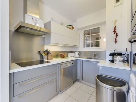 Property, Room, Furniture, Countertop, Kitchen, Cabinetry, Yellow, Interior Design, Building, Floor