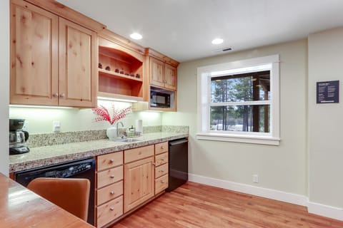 Downstairs common area with xbox, arcade system, kitchnette, pool table.