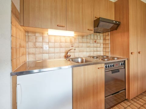 Cabinetry, Kitchen Sink, Countertop, Sink, Tap, Kitchen Stove, Kitchen, Kitchen Appliance, Building, Wood