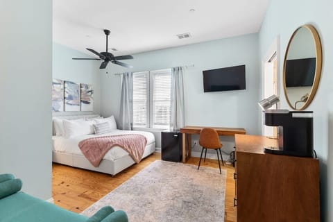 View of the queen bed and living space