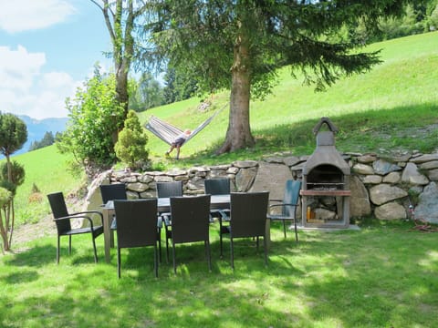 Plant, Property, Tree, Shade, Land Lot, Cloud, Outdoor Furniture, Table, Sky, Leisure