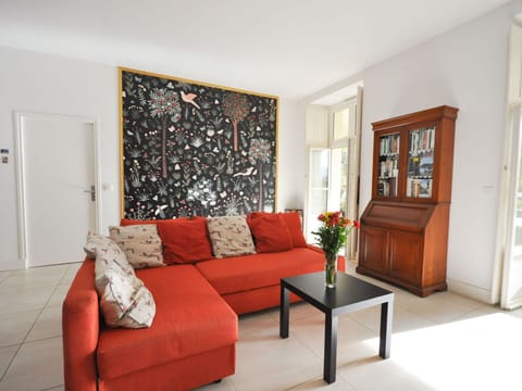 Furniture, Property, Picture Frame, Couch, Plant, Table, Wood, Interior Design, Orange, Comfort