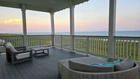 2nd floor: 2nd deck with cover, day bed, outdoor sofa and the gorgeous Gulf view