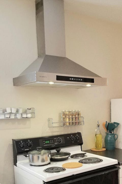 Seasonings and all the cookware you need to make a delicious supper. 