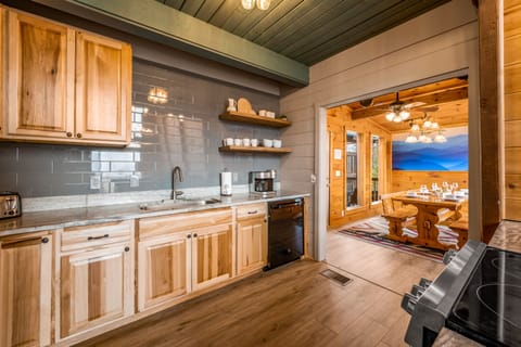 Luxury, open concept gourmet kitchen with a view of the Smokies!