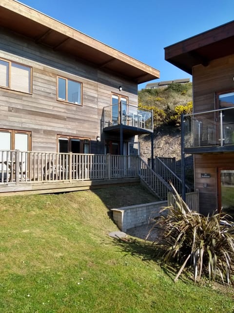 Timber clad eco-home. Front deck extended for 2026 season.