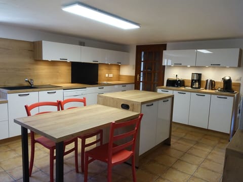 Cabinetry, Furniture, Property, Countertop, Table, Kitchen, Wood, Kitchen Appliance, Kitchen Stove, Chair