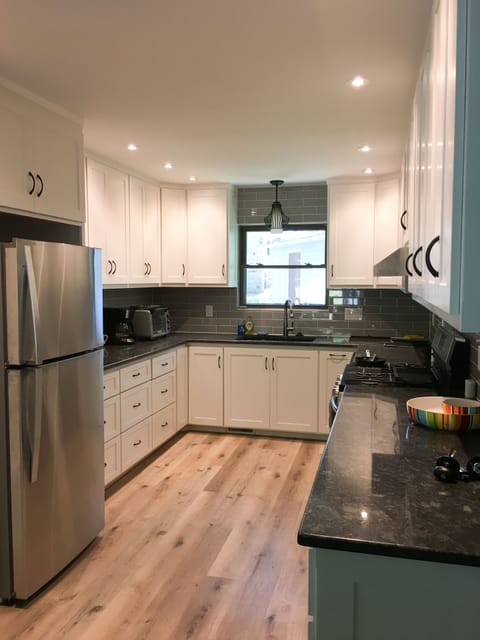 Kitchen with granite tops and gas cooktop