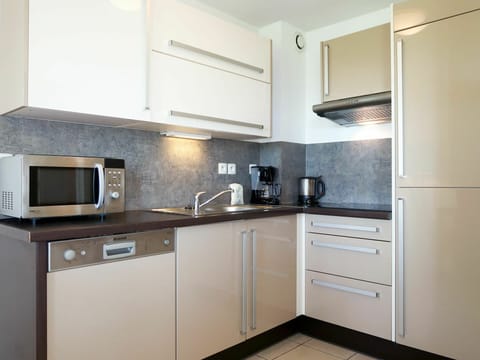 Property, Room, Cabinetry, Countertop, Kitchen, Furniture, Building, Interior Design, Kitchen Stove, House