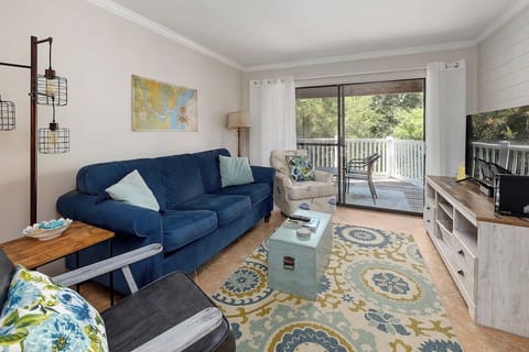 Shipwatch 214 - Living room area with access to balcony
