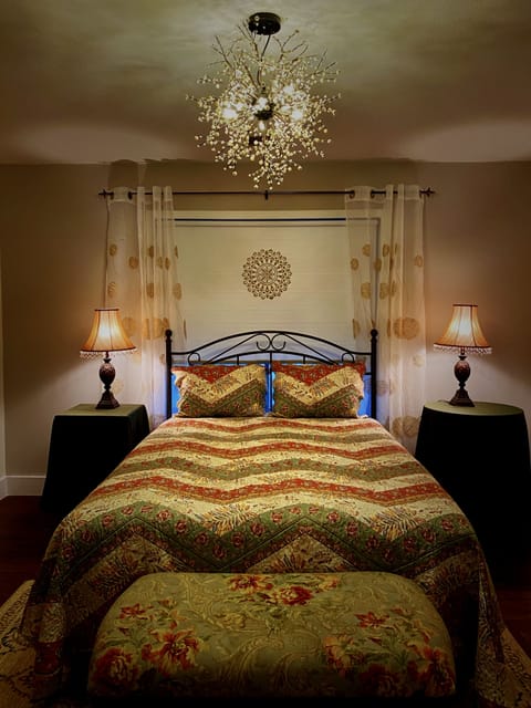 Room fit for a Queen, room with Queen bed dresser and mirror.  Cozy and inviting