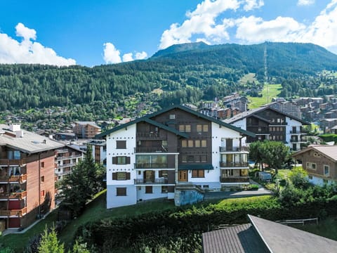 Cloud, Sky, Building, Daytime, Property, Plant, Nature, Azure, Mountain, Window