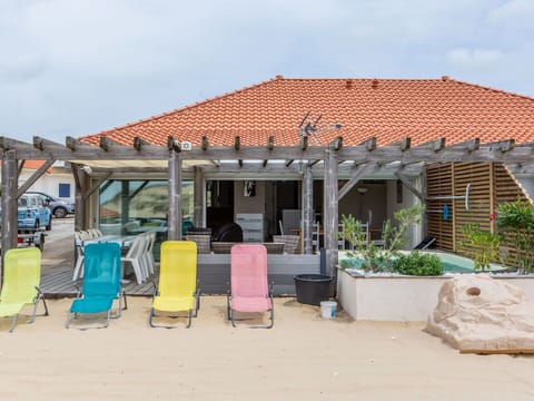 Sky, Property, Plant, Building, Window, Shade, Door, Cloud, Chair, House