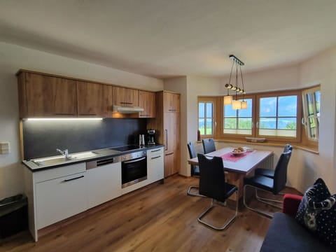 Furniture, Interior Design, Wood, Flooring, Ceiling, Floor, Room, Kitchen, Cabinetry, Countertop