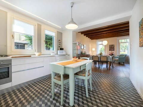 Furniture, Property, Table, Building, Window, Cabinetry, Countertop, Wood, Tap, Chair