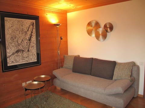 Brown, Property, Couch, Furniture, Picture Frame, Wood, Interior Design, Lighting, Flooring, Floor
