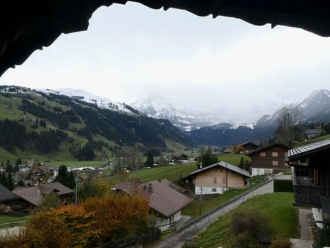 Sky, Cloud, Plant, Building, Mountain, Nature, Highland, Natural Landscape, Architecture, Vegetation