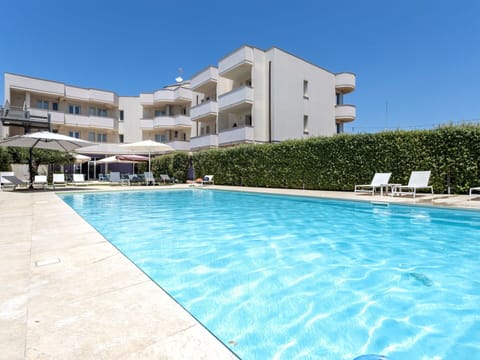 Water, Sky, Building, Property, Plant, Swimming Pool, Azure, Window, House, Tree