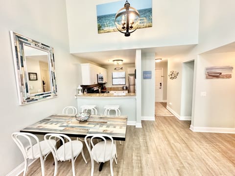 Our dining table seats 6 with additional seating at the bar