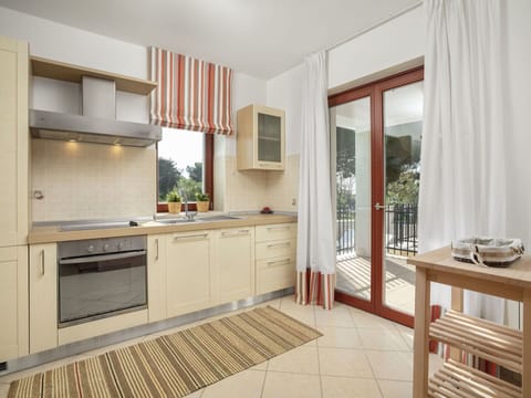 Furniture, Property, Room, Cabinetry, Interior Design, Building, Countertop, Kitchen, Floor, Real Estate