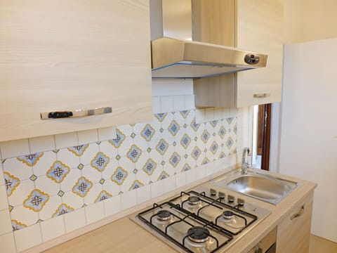 Property, Room, Tile, Kitchen, Furniture, Countertop, Cabinetry, Drawer, Floor, Interior Design