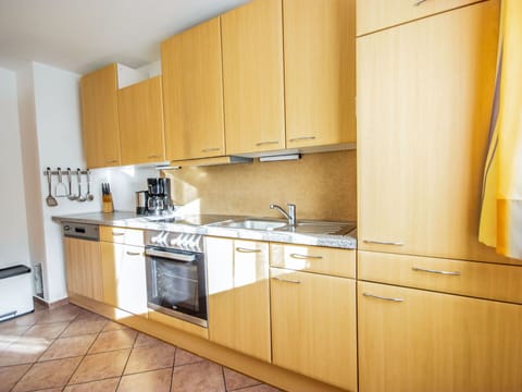 Cabinetry, Property, Room, Kitchen, Furniture, Countertop, Yellow, Interior Design, Building, House