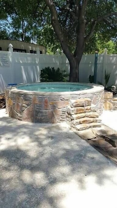 Shared Hot Tub. A 1 minute walk away.