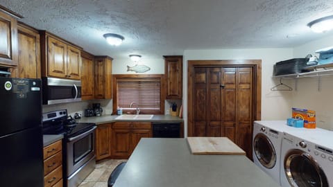 Full size kitchen equipped with all your kitchen needs.