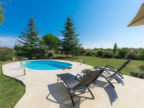 Plant, Water, Furniture, Sky, Swimming Pool, Chair, Outdoor Furniture, Tree, Shade, Building