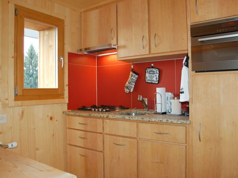 Cabinetry, Room, Kitchen, Furniture, Countertop, Property, Kitchen Stove, Cupboard, Plywood, House