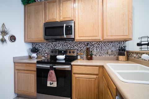 Kitchen has plenty of counter space for preparing gourmet meals