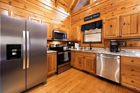 Brand new kitchen appliances and granite countertops.