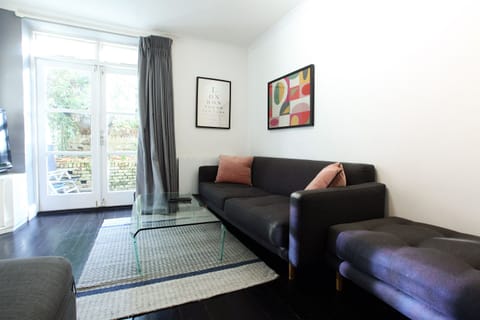 Living room and exit to patio garden