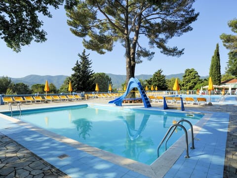 Water, Sky, Swimming Pool, Azure, Tree, Shade, Outdoor Furniture, Leisure, Aqua, Resort Town