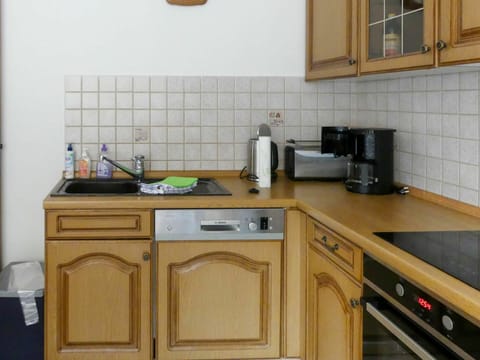 Cabinetry, Countertop, Property, Kitchen Sink, Kitchen Appliance, Kitchen Stove, Kitchen, Wood, Drawer, Home Appliance