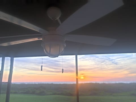 Brand new ceiling fan on screened patio, great for watching the sun rise!