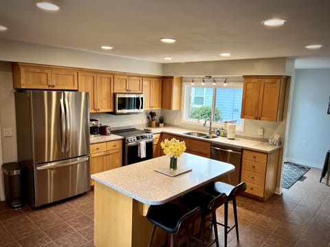Kitchen with new appliances.  Fully stocked!