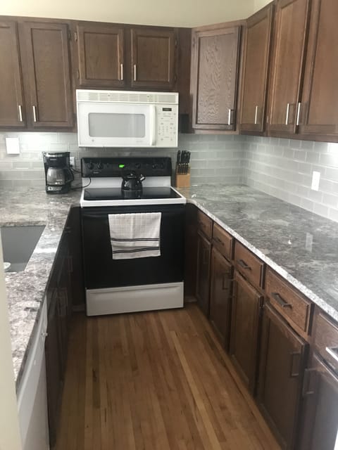 updated stocked galley kitchen