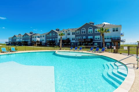 Shimmering pool just steps to the beach on a private pathway!