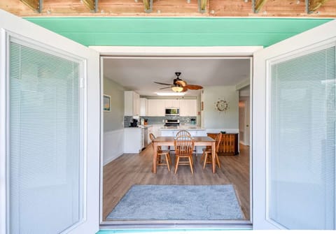 Open up the doors to take in the ocean breeze over a home-cooked meal. (downstairs unit)