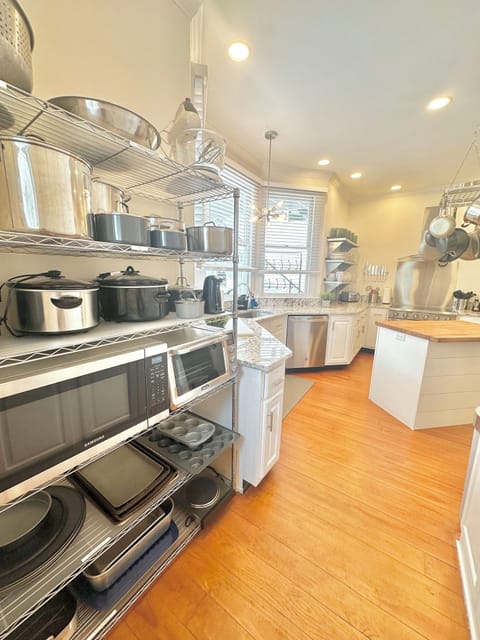 Kitchen area is spacious and fully stocked!