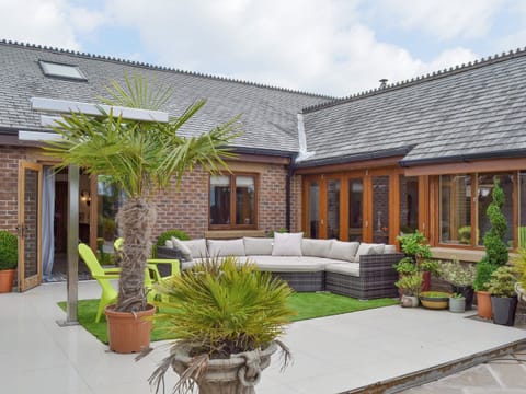 Lovely patio area with outdoor furniture | Carr End Barn A, Stalmine, near Poulton-le-Flyde