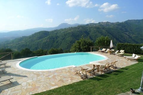 Large comfortable sun terrace with 'infinity' pool. Stunning views