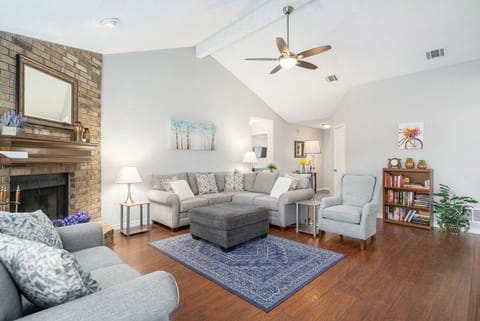 Warm, inviting living room w/ comfy sofas & chairs and plenty of room to relax 