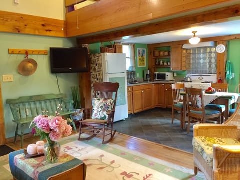 living area with mounted television